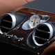 Illustration for article titled The Bentley Bentayga Has A Trunk Full Of Champagne And Diamonds In Its Clock